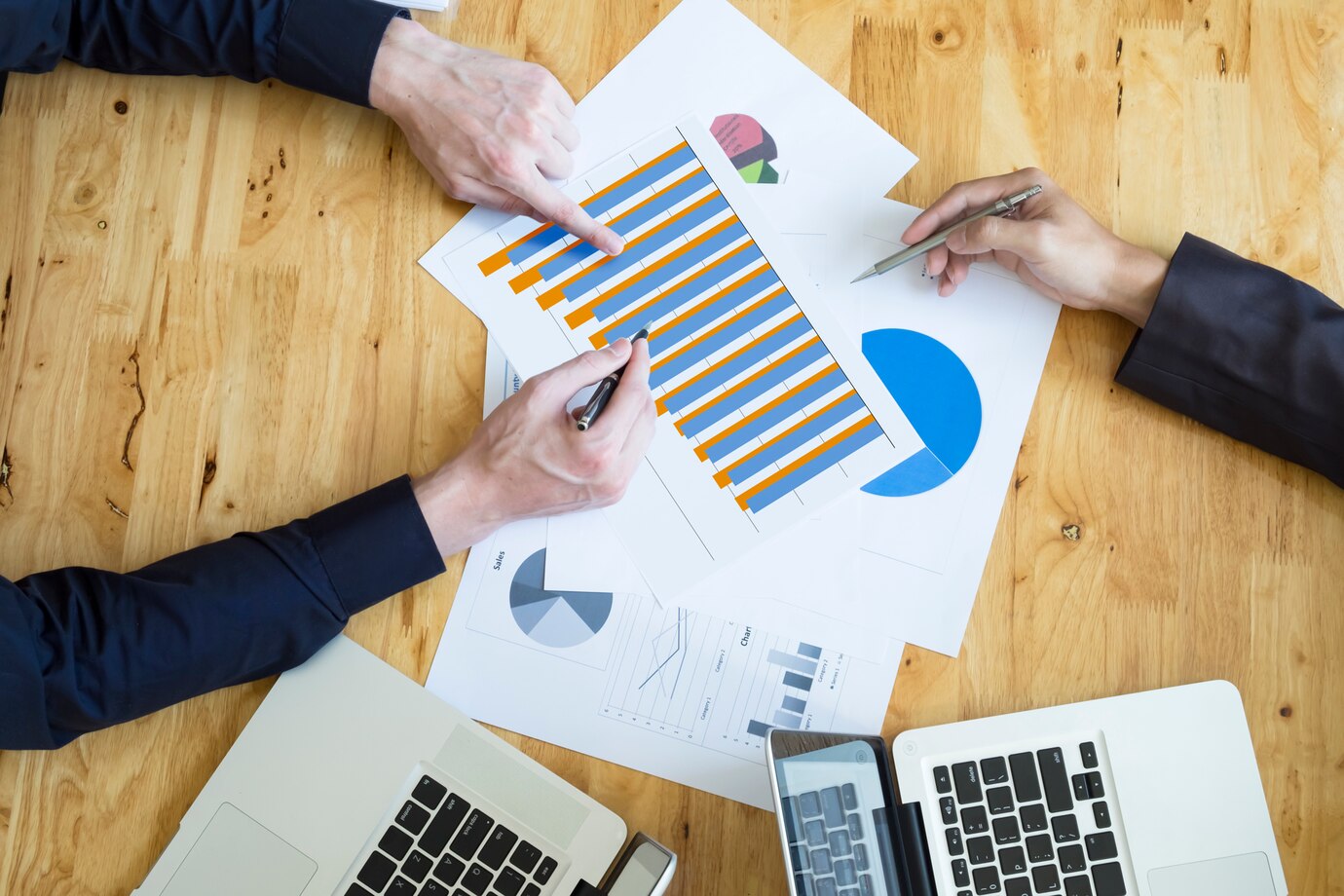 business person looking finance graphs